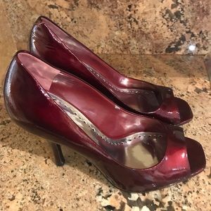 BCBGeneration Red patent Peep toe heels